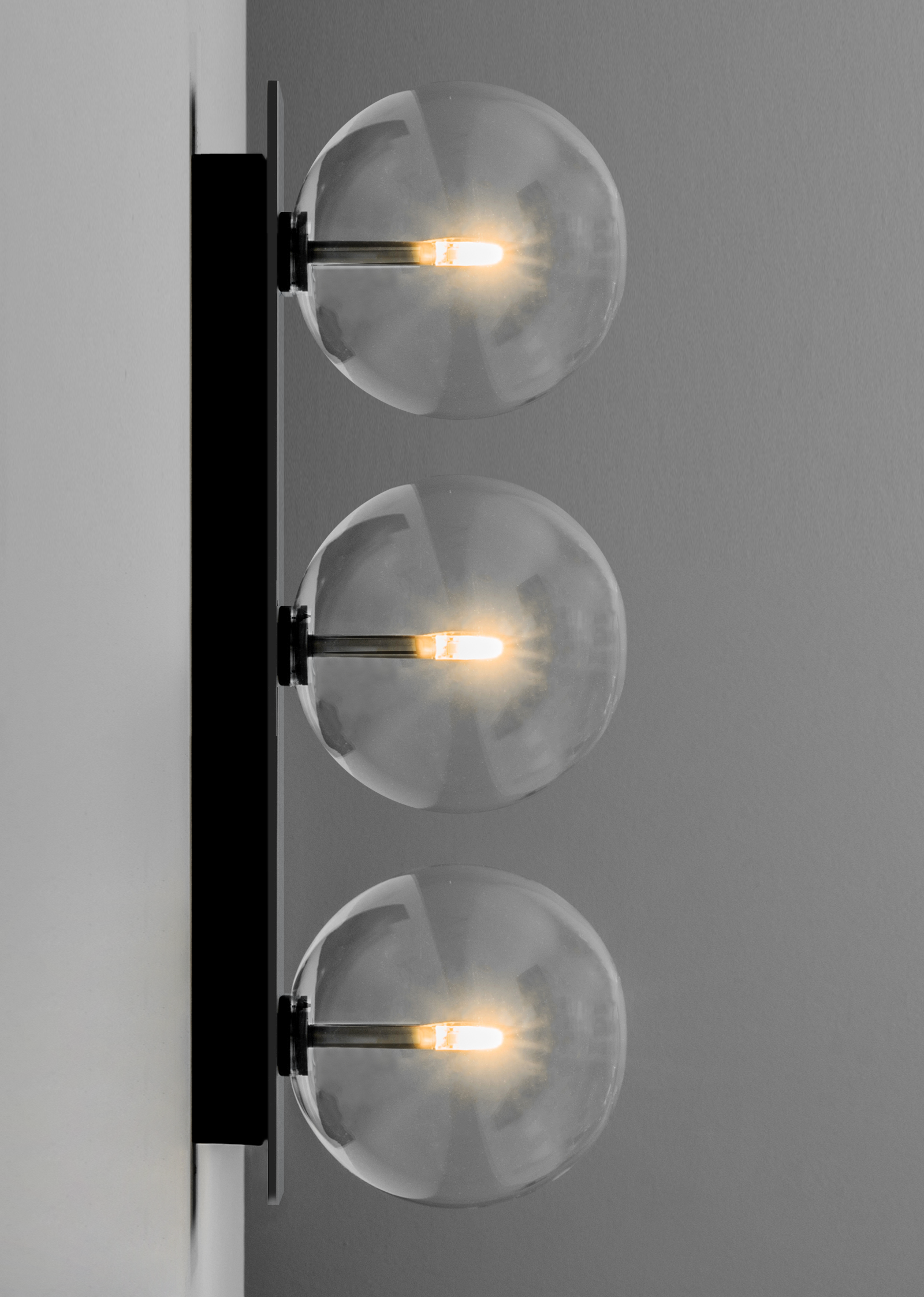 Schwung Oslo Triple Black Gunmetal Transparent Globe Wall Light
